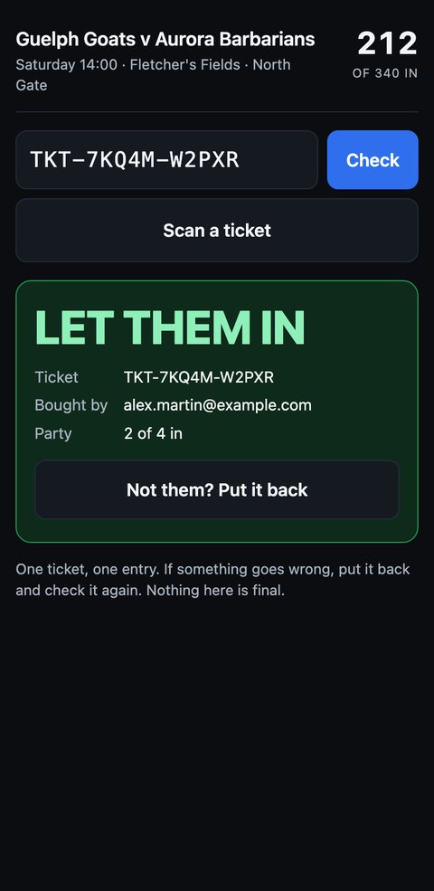 The gate on a volunteer's phone: the ticket checked, a green LET THEM IN, and 2 of 4 in the party.